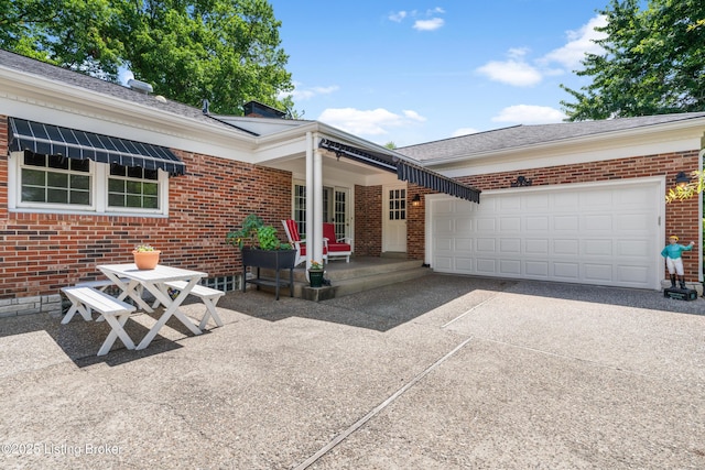 3012 Hayfield Dr, Louisville, KY 40205 - view of front of house with brick siding, concrete driveway, an attached garage, and roof with shingles