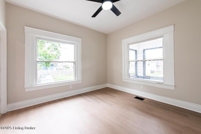 412 Gwendolyn St, Louisville, KY 40203 - unfurnished room featuring wood finished floors and ceiling fan