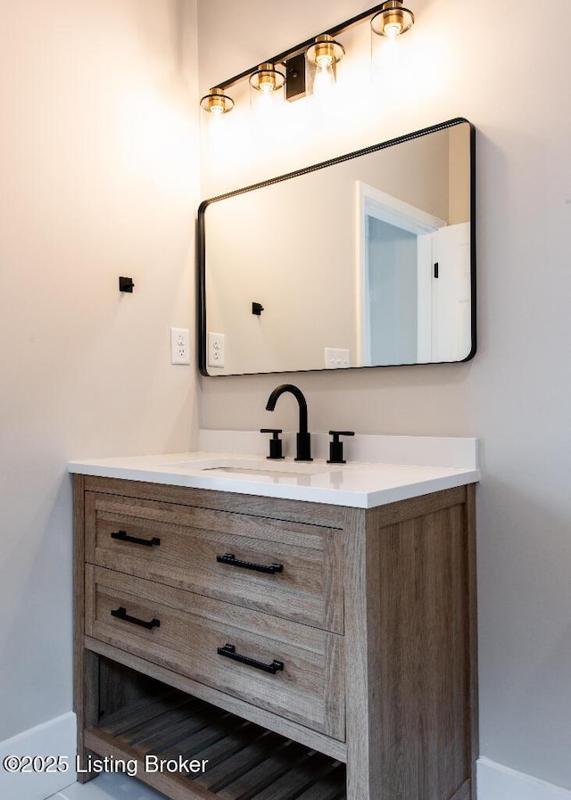 412 Gwendolyn St, Louisville, KY 40203 - bathroom with vanity and baseboards