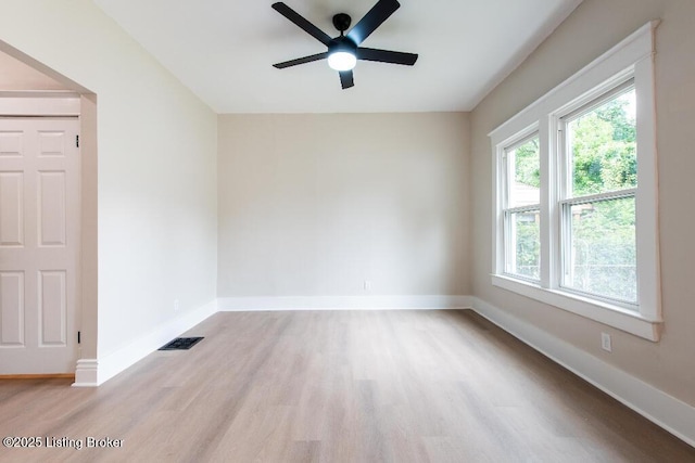 412 Gwendolyn St, Louisville, KY 40203 - empty room with light wood-style flooring and a ceiling fan