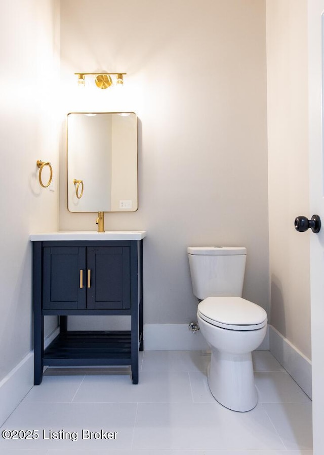 412 Gwendolyn St, Louisville, KY 40203 - half bath with vanity and tile patterned floors