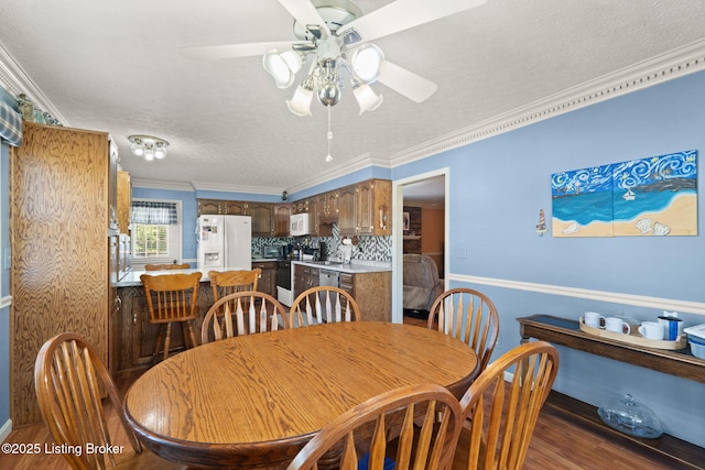 3941 Scenic Trl, Shepherdsville, KY 40165 - dining area with a ceiling fan, ornamental molding, wood finished floors, and a textured ceiling
