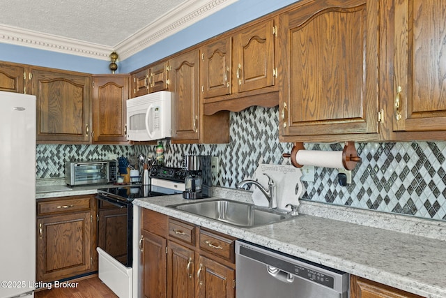 3941 Scenic Trl, Shepherdsville, KY 40165 - kitchen with white appliances, brown cabinets, a textured ceiling, and ornamental molding