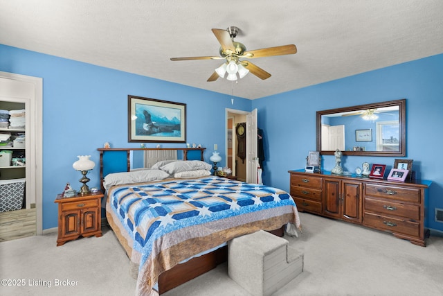 3941 Scenic Trl, Shepherdsville, KY 40165 - bedroom with light carpet, a ceiling fan, and a textured ceiling
