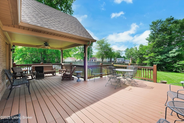 7728 Cottage Cove Way, Louisville, KY 40214 - wooden terrace featuring outdoor dining area, ceiling fan, and an outdoor living space