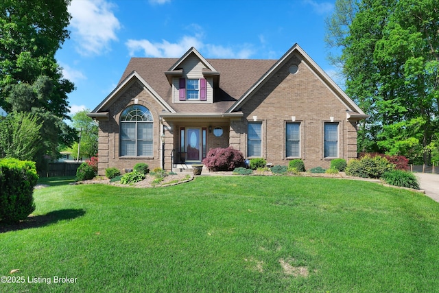 7728 Cottage Cove Way, Louisville, KY 40214 - view of front of home with brick siding, a front lawn, and a shingled roof