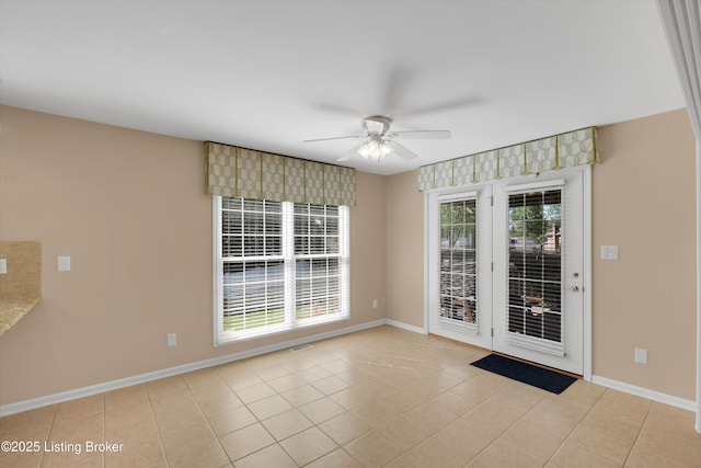7728 Cottage Cove Way, Louisville, KY 40214 - tiled empty room featuring ceiling fan and baseboards