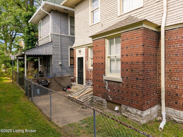 1246 Ormsby Ct, Louisville, KY 40203 - view of exterior entry featuring brick siding