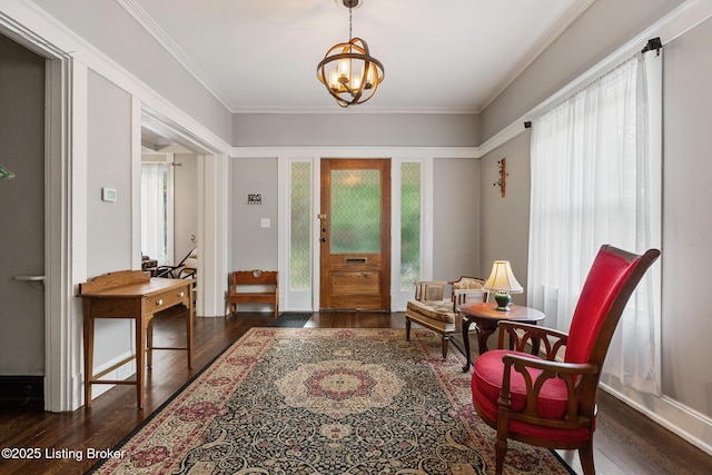 1246 Ormsby Ct, Louisville, KY 40203 - entrance foyer with wood finished floors, a chandelier, and crown molding