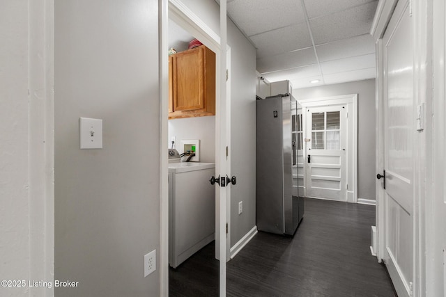 1246 Ormsby Ct, Louisville, KY 40203 - corridor with washer / clothes dryer, dark wood finished floors, and a paneled ceiling