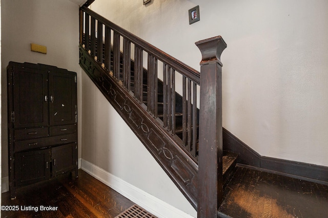 1246 Ormsby Ct, Louisville, KY 40203 - stairway with wood finished floors and baseboards