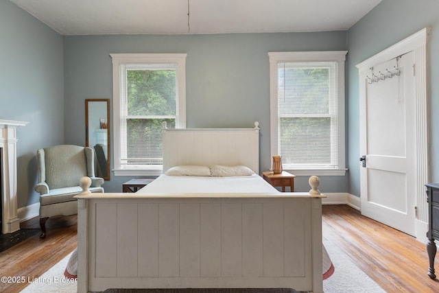 1246 Ormsby Ct, Louisville, KY 40203 - bedroom with light wood-style floors and baseboards