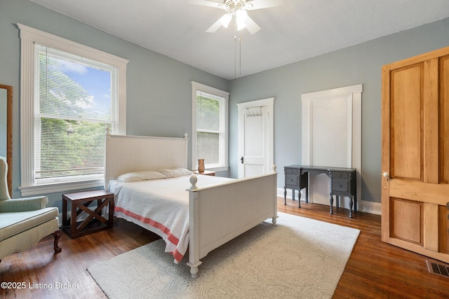 1246 Ormsby Ct, Louisville, KY 40203 - bedroom featuring multiple windows, dark wood-style flooring, and ceiling fan