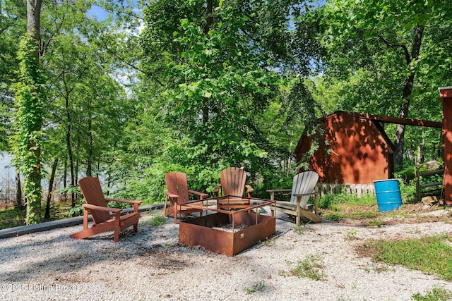 422 Lilac Ln, Cub Run, KY 42729 - view of yard featuring a fire pit and an outbuilding