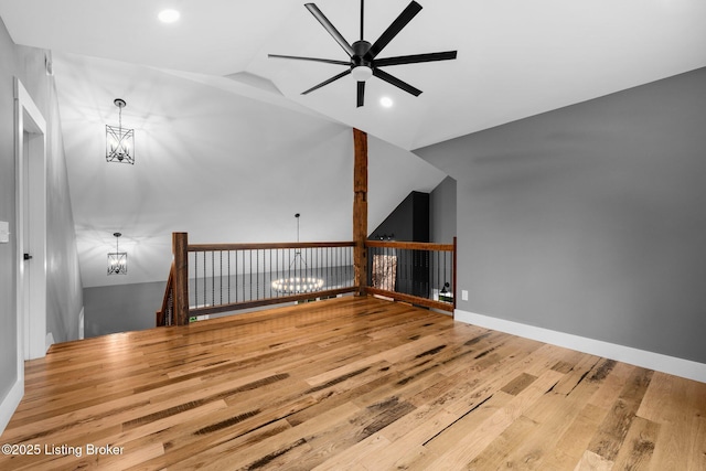 422 Lilac Ln, Cub Run, KY 42729 - unfurnished living room featuring ceiling fan, a chandelier, wood finished floors, vaulted ceiling, and recessed lighting