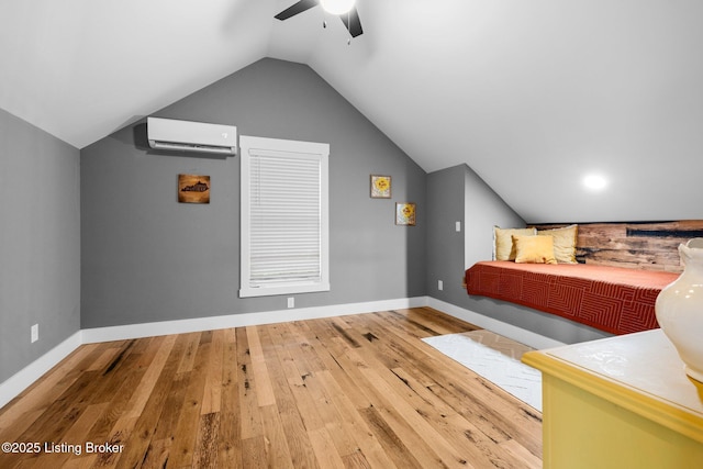 422 Lilac Ln, Cub Run, KY 42729 - bedroom featuring a wall mounted air conditioner, vaulted ceiling, hardwood / wood-style floors, and ceiling fan