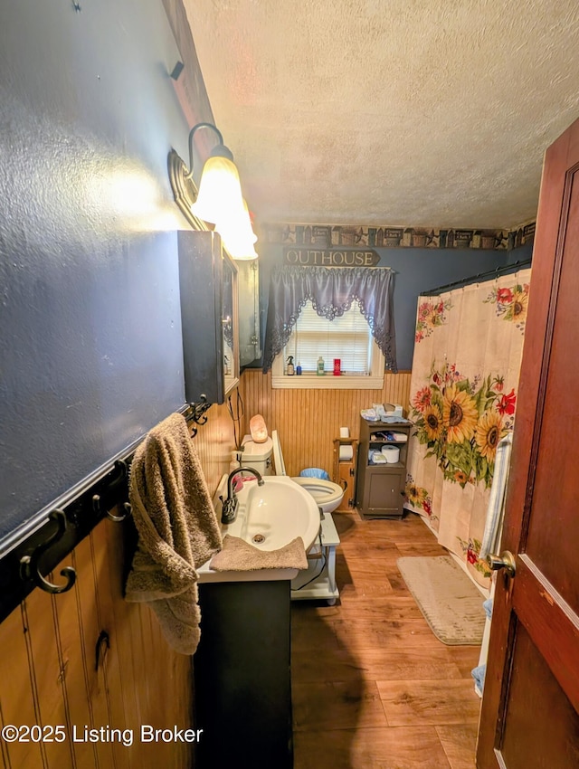 118 Hardin Spring Rd, Big Clifty, KY 42712 - bedroom with a textured ceiling and wood finished floors