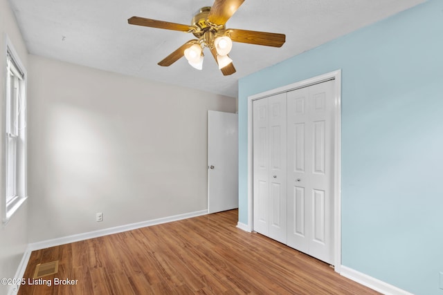 6818 Village Green Blvd, Pewee Valley, KY 40056 - unfurnished bedroom featuring wood finished floors, a closet, and ceiling fan