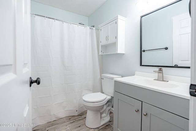 372 Wild Way, Louisville, KY 40229 - full bath featuring wood finished floors, vanity, and a shower with curtain