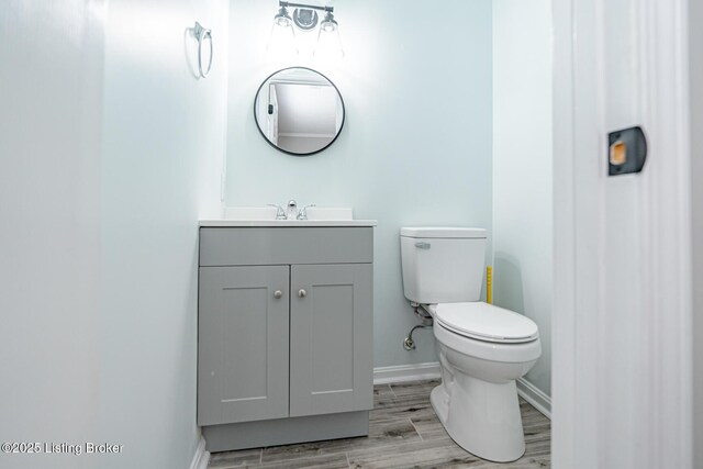 372 Wild Way, Louisville, KY 40229 - half bath with vanity and wood finished floors
