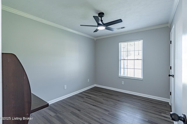 372 Wild Way, Louisville, KY 40229 - spare room featuring dark wood-style floors, a ceiling fan, and crown molding
