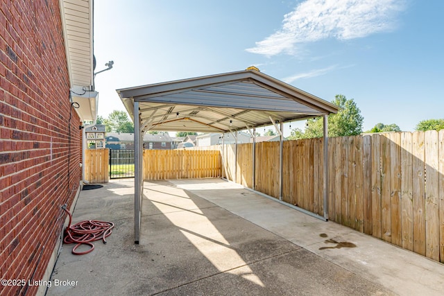 372 Wild Way, Louisville, KY 40229 - view of patio / terrace featuring a detached carport