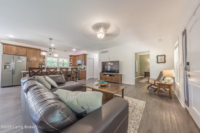 164 Greenshores Circle Ln, Mcdaniels, KY 40152 - living area featuring wood finished floors and ceiling fan