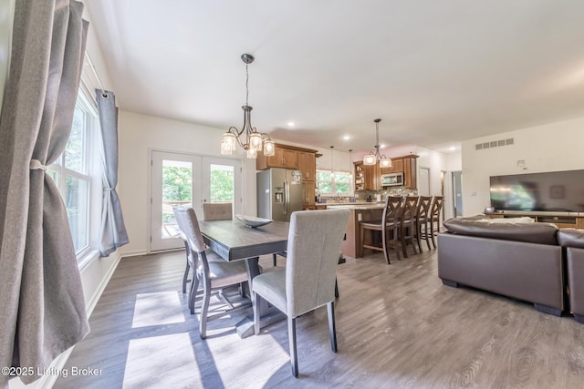164 Greenshores Circle Ln, Mcdaniels, KY 40152 - dining area with a chandelier, light wood-style flooring, recessed lighting, and french doors
