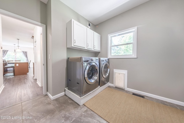 164 Greenshores Circle Ln, Mcdaniels, KY 40152 - laundry room with cabinet space, washer and dryer, and healthy amount of natural light
