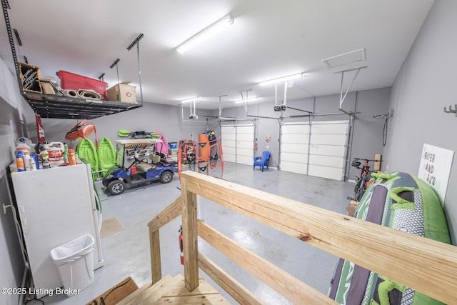 164 Greenshores Circle Ln, Mcdaniels, KY 40152 - garage with a garage door opener