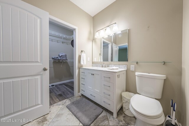164 Greenshores Circle Ln, Mcdaniels, KY 40152 - bathroom with vanity and a walk in closet