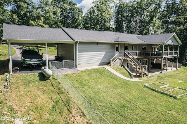 164 Greenshores Circle Ln, Mcdaniels, KY 40152 - view of front of house with a wooden deck, stairway, driveway, a shingled roof, and a carport