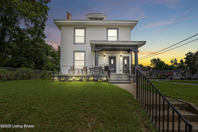 1373 Cypress St, Louisville, KY 40211 - rear view of property with a porch and a chimney