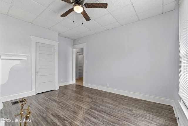 1373 Cypress St, Louisville, KY 40211 - spare room with a paneled ceiling, wood finished floors, and ceiling fan