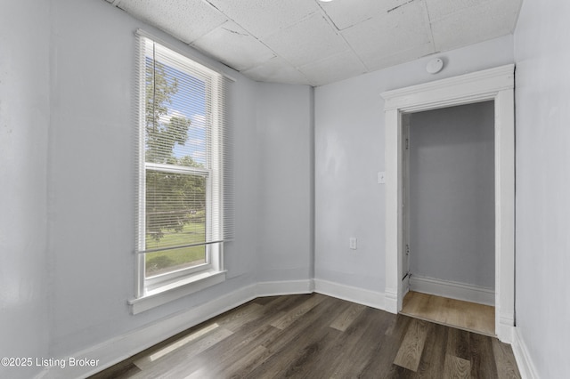 1373 Cypress St, Louisville, KY 40211 - unfurnished bedroom with dark wood-type flooring and a paneled ceiling