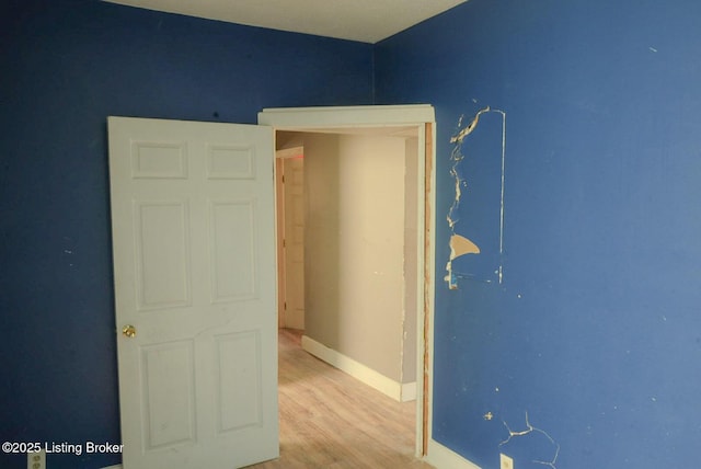 2809 Rowan St, Louisville, KY 40212 - unfurnished room with light wood-style flooring and baseboards