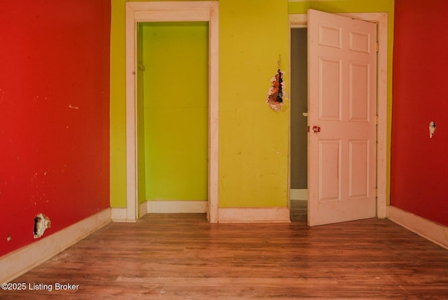 2809 Rowan St, Louisville, KY 40212 - empty room featuring wood finished floors