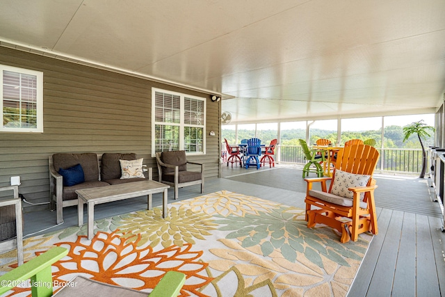 309 Clarks Ln, Clarkson, KY 42726 - sunroom with hardwood / wood-style flooring, an outdoor living space, healthy amount of natural light, and wood walls