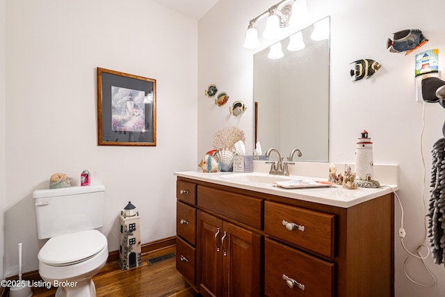 309 Clarks Ln, Clarkson, KY 42726 - bathroom featuring vanity and wood finished floors