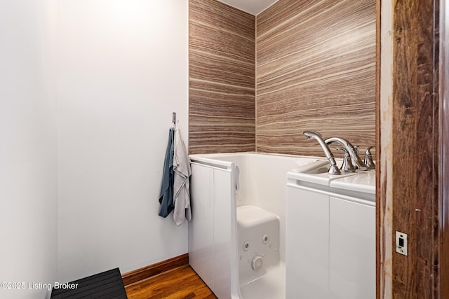 309 Clarks Ln, Clarkson, KY 42726 - laundry room with wood finished floors