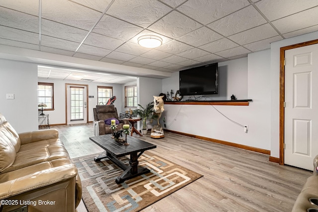 309 Clarks Ln, Clarkson, KY 42726 - living room featuring a drop ceiling and wood finished floors