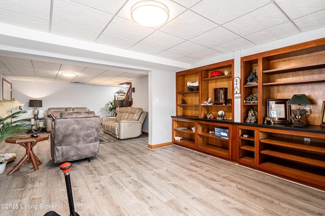 309 Clarks Ln, Clarkson, KY 42726 - living area featuring wood finished floors and a paneled ceiling