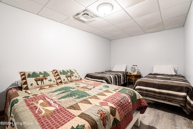 309 Clarks Ln, Clarkson, KY 42726 - bedroom with wood finished floors and a drop ceiling
