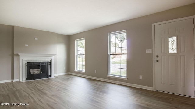 4720 Ferrer Way, Jeffersontown, KY 40299 - unfurnished living room with wood finished floors and a tiled fireplace