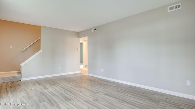 4720 Ferrer Way, Jeffersontown, KY 40299 - spare room featuring light wood-style flooring and stairs