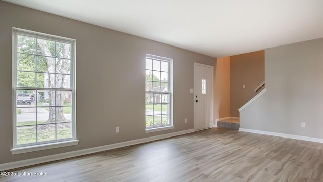 4720 Ferrer Way, Jeffersontown, KY 40299 - entrance foyer with light wood-style floors and baseboards