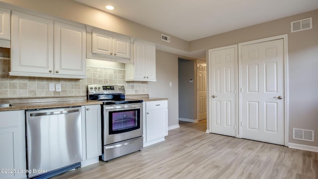 4720 Ferrer Way, Jeffersontown, KY 40299 - kitchen with appliances with stainless steel finishes, white cabinetry, light wood-type flooring, tasteful backsplash, and recessed lighting