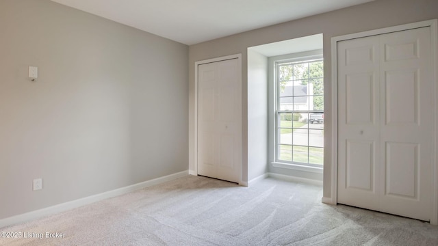 4720 Ferrer Way, Jeffersontown, KY 40299 - unfurnished bedroom featuring light carpet and multiple windows