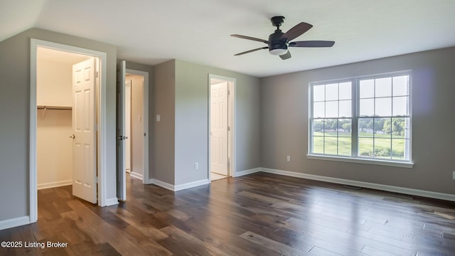 4720 Ferrer Way, Jeffersontown, KY 40299 - unfurnished bedroom featuring a spacious closet, a closet, dark wood-style flooring, and a ceiling fan