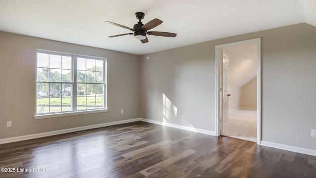 4720 Ferrer Way, Jeffersontown, KY 40299 - empty room featuring dark wood-type flooring, ceiling fan, and vaulted ceiling
